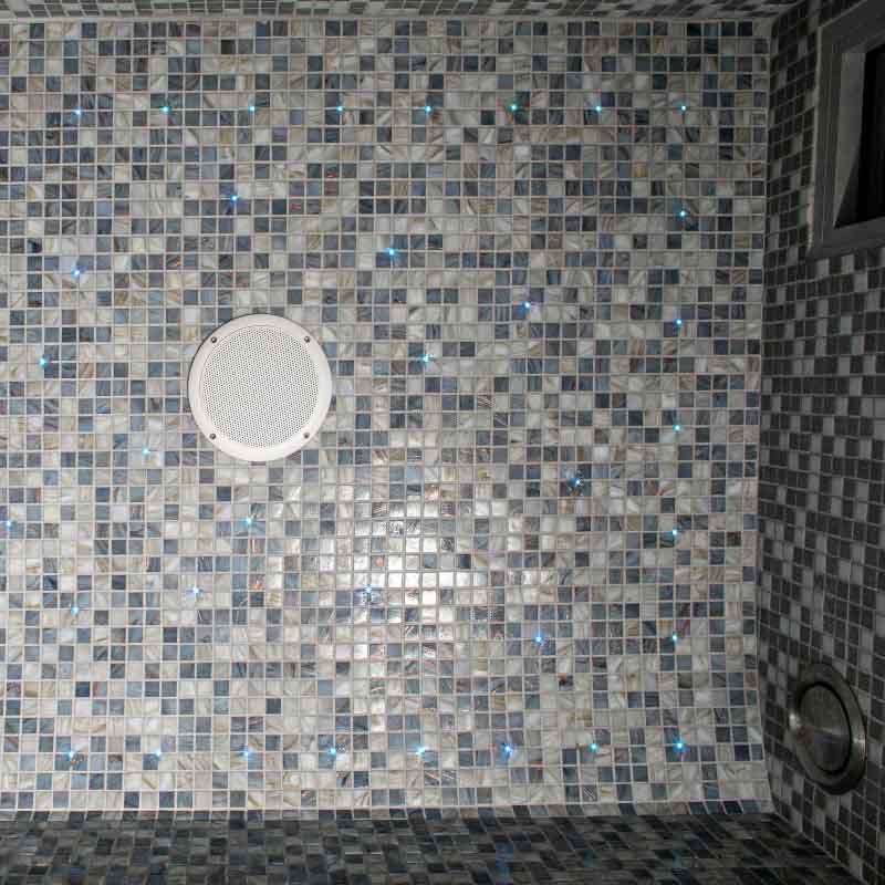 Mist outdoor Turkish bath with shower and built-in sound system.