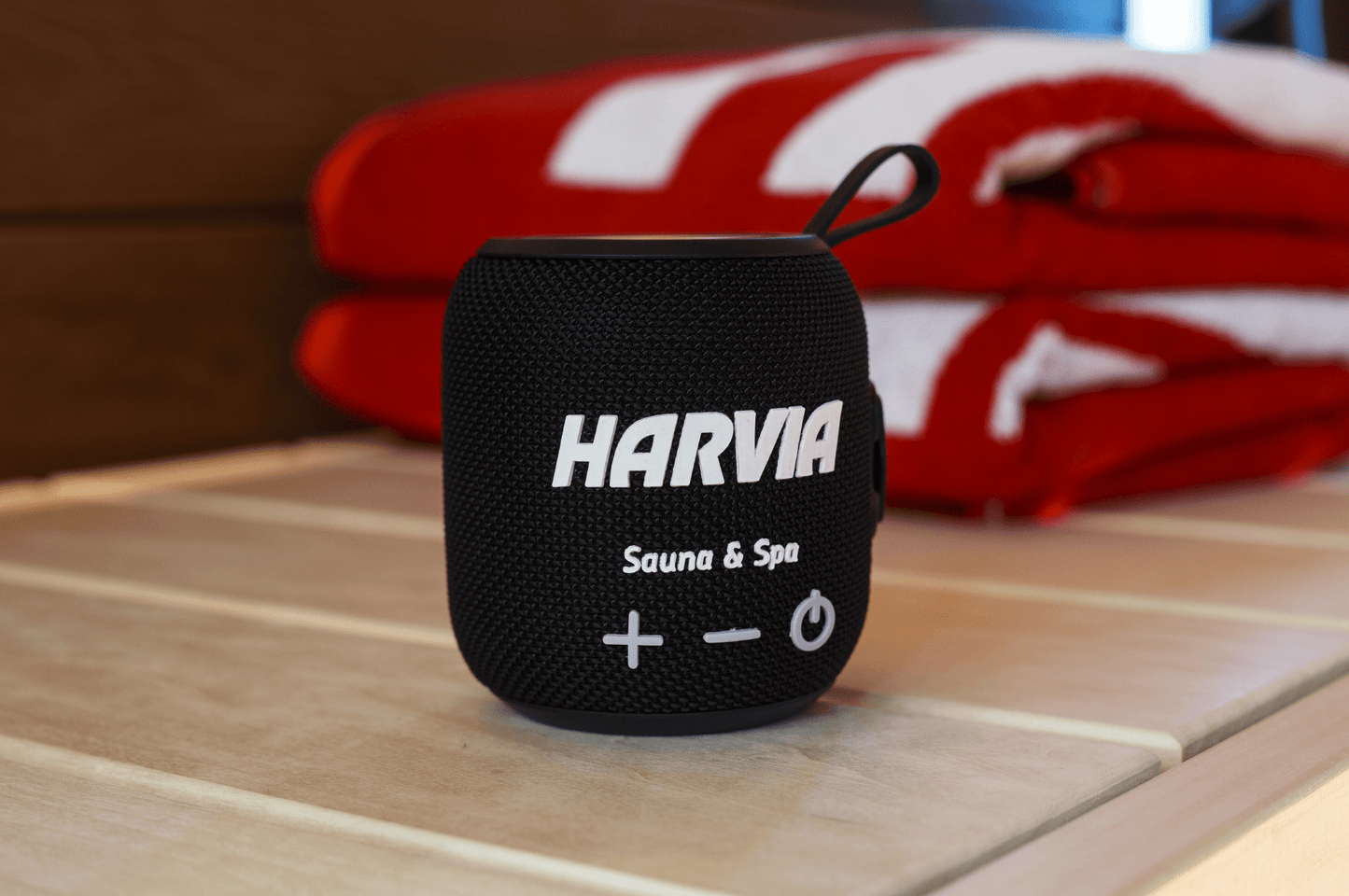 Harvia Sauna Bluetooth Speaker on table.