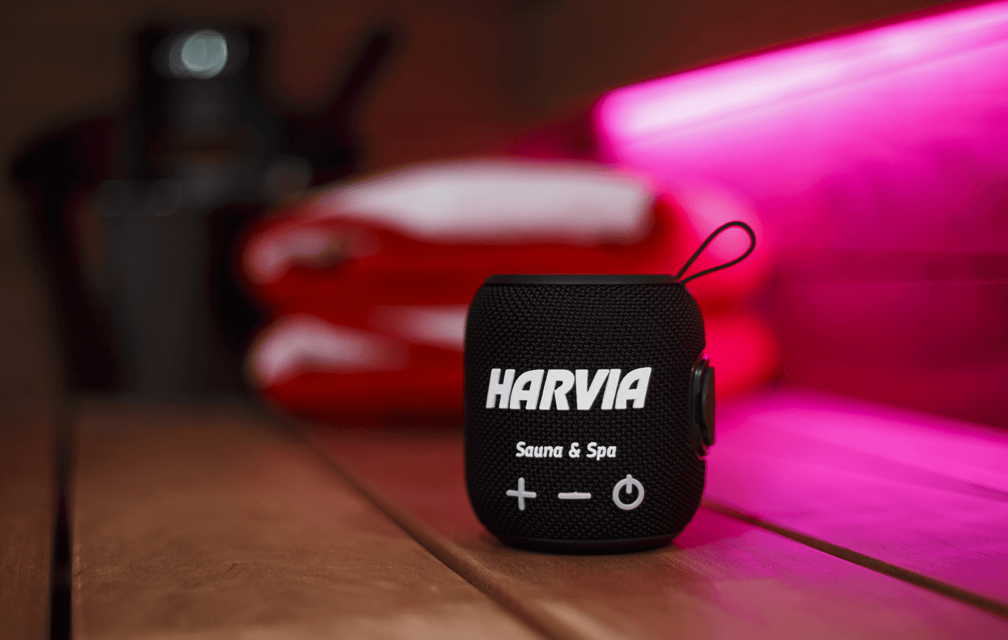 Harvia Bluetooth sauna speaker with wooden surface.