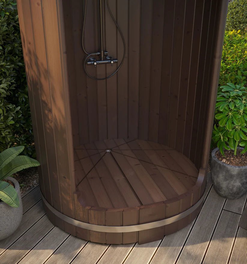Wooden barrel shower on the deck.