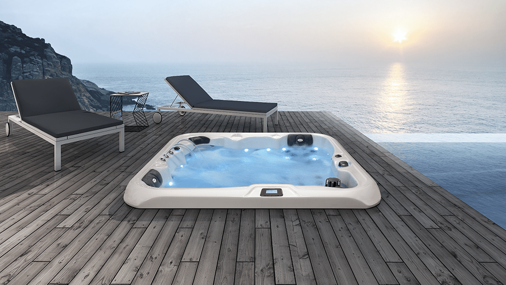 Double 520 outdoor Jacuzzi on deck overlooking the ocean.