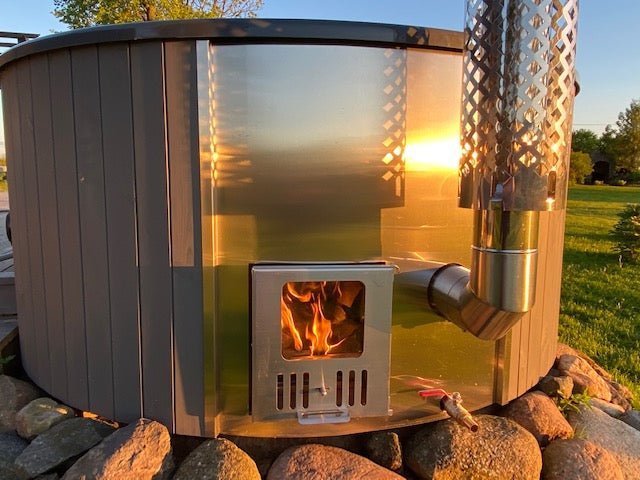 Thermalux 200 outdoor Jacuzzi with visible central fire.