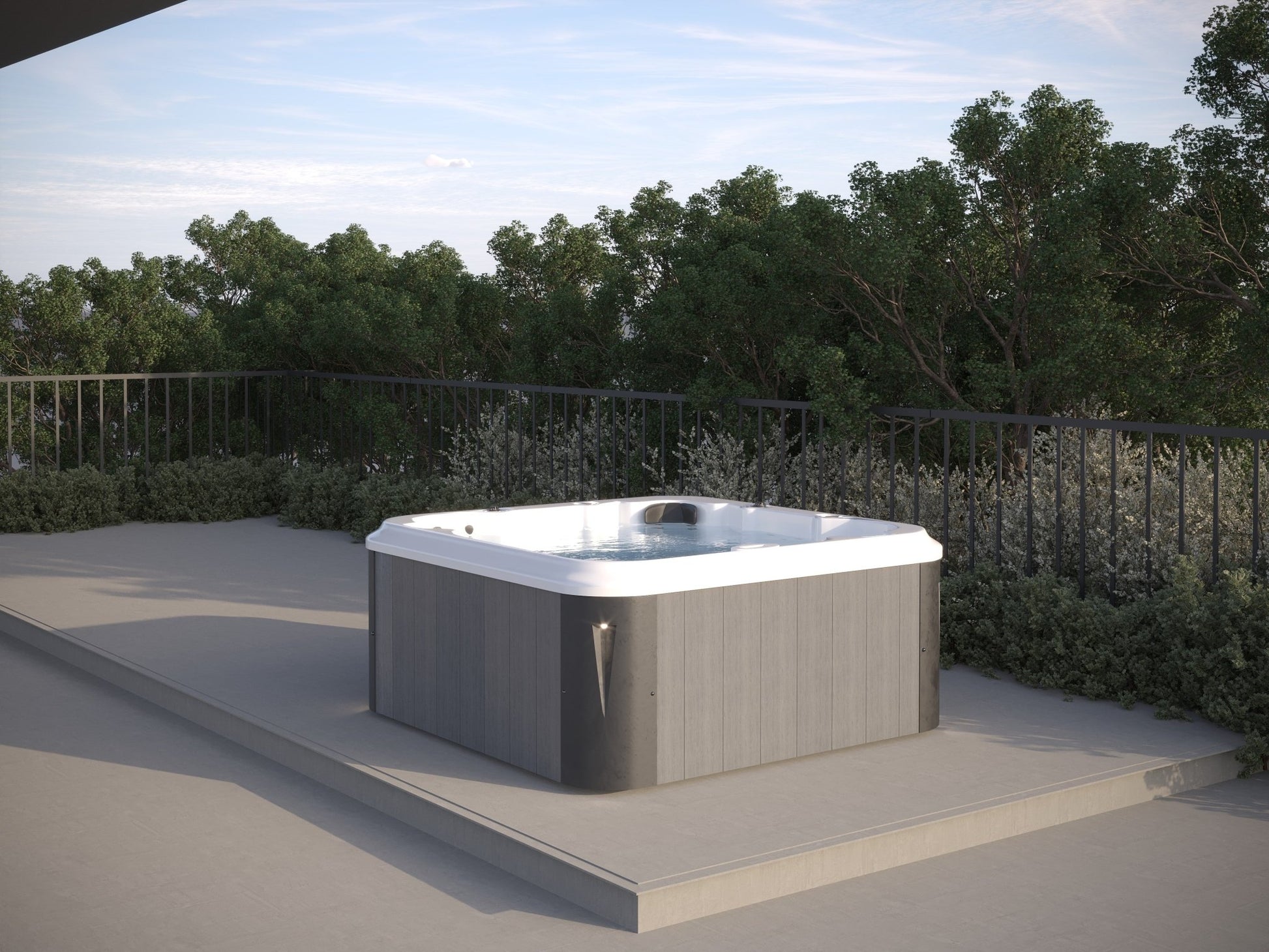 Outdoor Jacuzzi Aurora 4 on a patio.