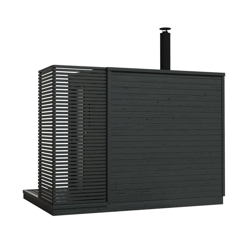 KUUT M wood-burning sauna with visible chimney.