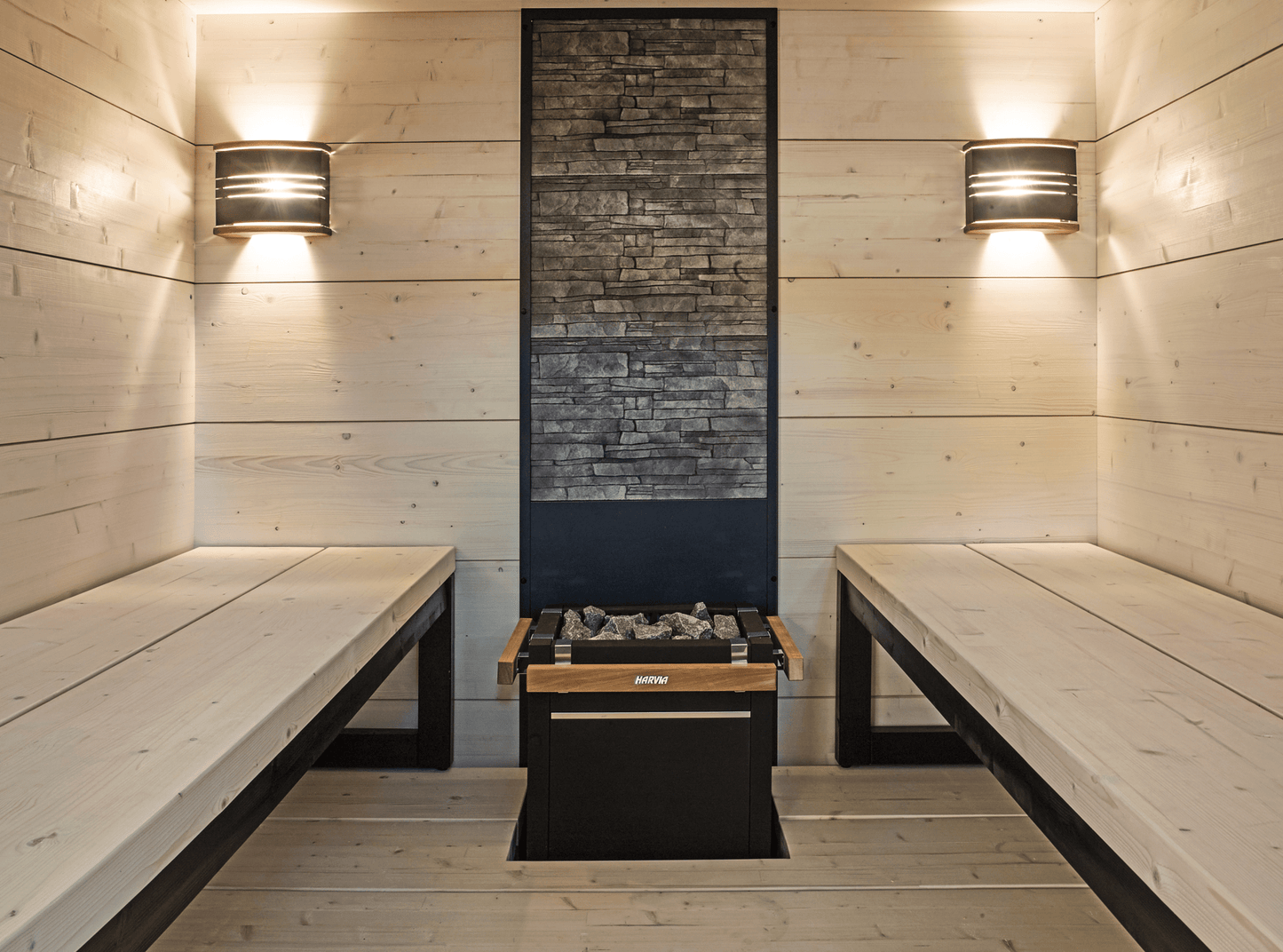 Solide sauna with wooden benches and heater.