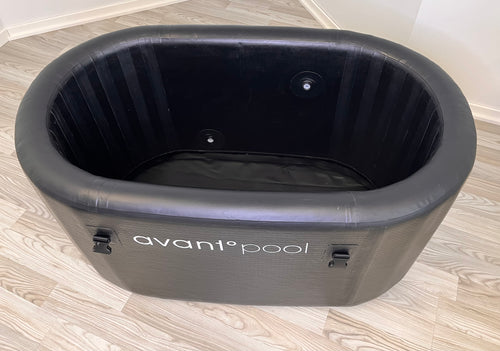 Inflatable ice bath - Kide on wooden floor.