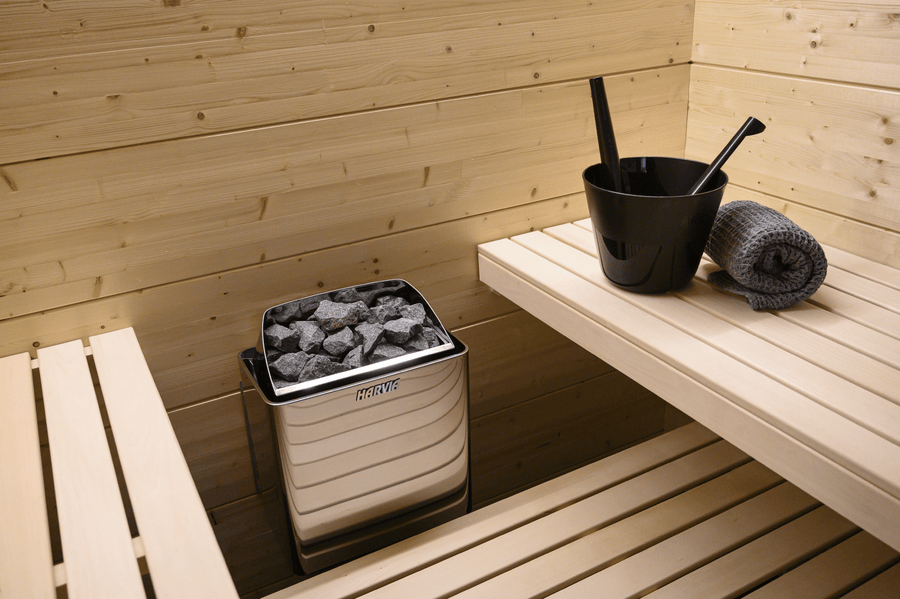 Harvia KIP electric sauna heater with buckets.