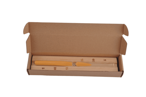 Sauna accessory set with hourglass and bucket.