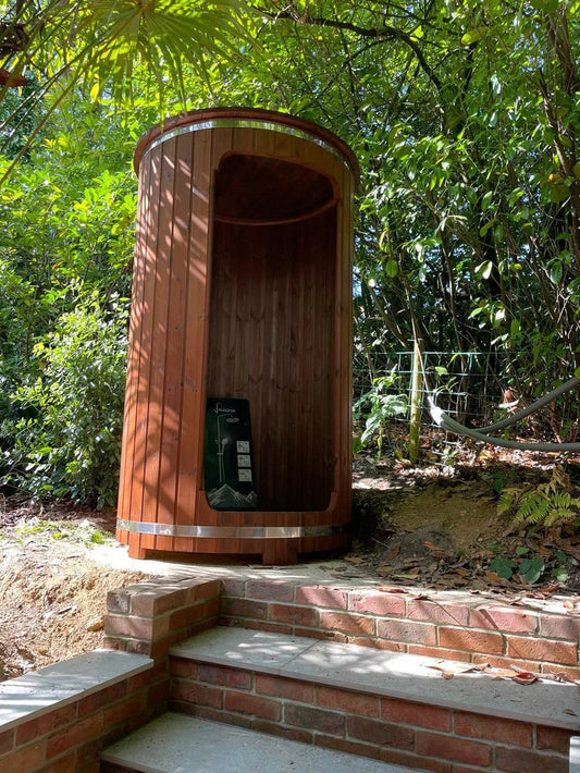 Outdoor wooden barrel shower.