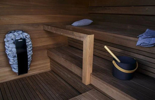 Harvia Spirit electric heater in wooden sauna.