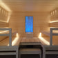 Cariitti Linear LED 2m instalado em sauna com bancos de madeira.