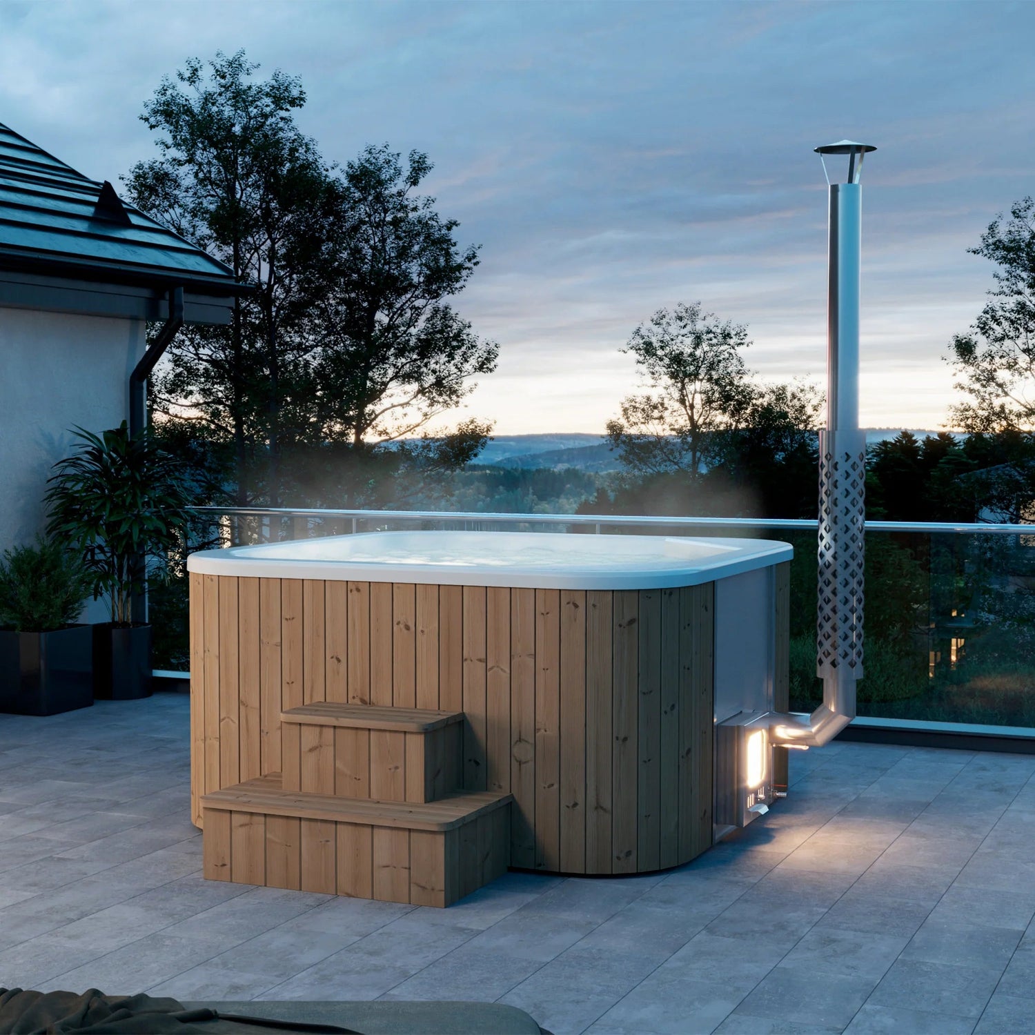 Calypso 200 outdoor Jacuzzi in a courtyard with stairs.