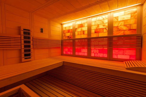 Himalaya+ infrared sauna with lighting and bench.