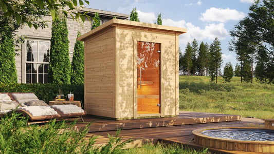 Sauna esterna Box con design nordico e porta in vetro.