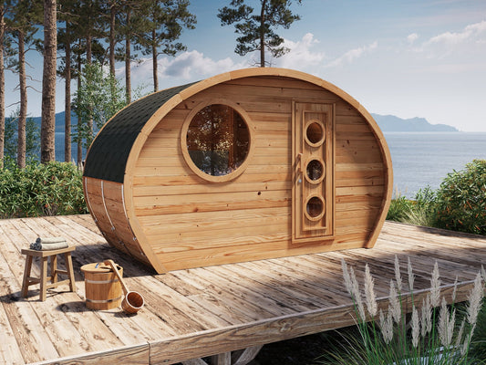 Sauna esterna Hobbit 195 con design curvo e finestra circolare.