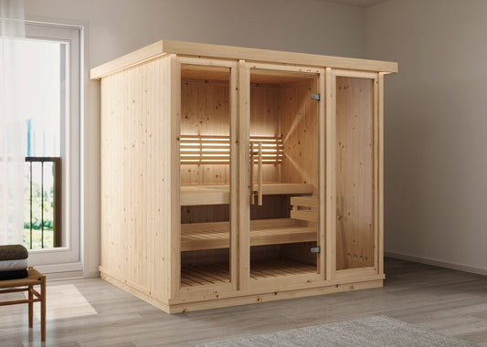 Grande sauna interna in legno con porte in vetro.