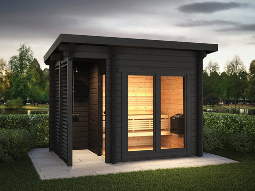 Deluxe Plus outdoor sauna in a grassy area.