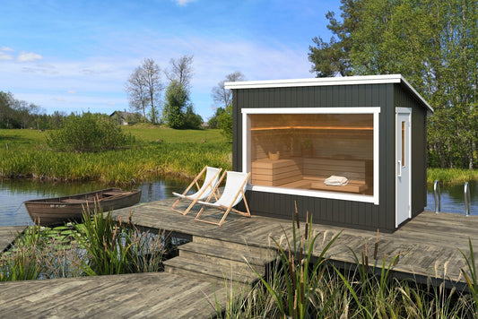 Sauna esterna modulare su una terrazza con sedie.